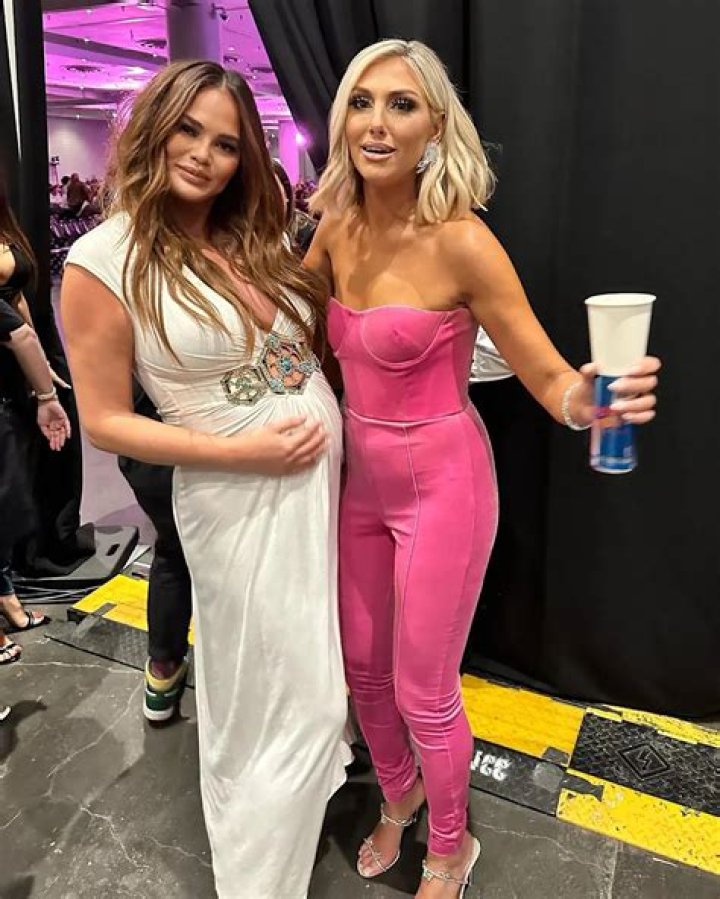 
Chrissy Teigen Fangirls Over ‘RHOC’ Cast at 2022 BravoCon Wearing a Sky Brand Dress: ‘Forever an OC Girl’ 