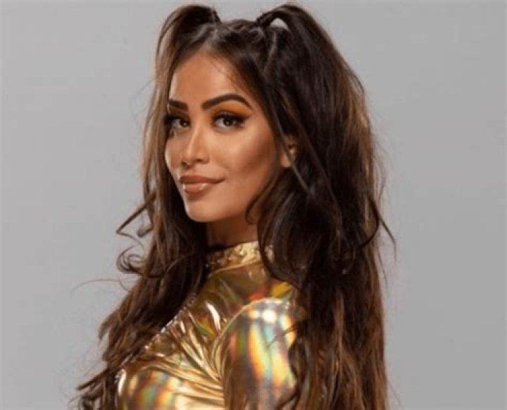 Ex WWE Star Aliyah Shares Swimsuit Photo Doing Squats by the Pool — Celebwell