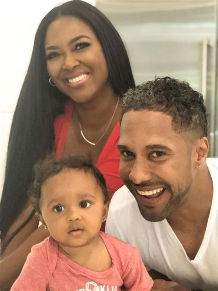 Kenya Moore’s Husband, Marc Daly, Kisses His Lookalike Baby And Flaunts Massive Muscle In New Picture