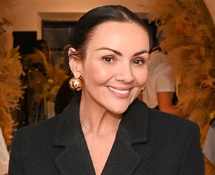 Martine McCutcheon in Bathing Suit "Booked Our Holiday" — Celebwell