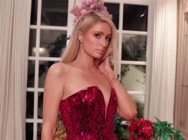 Paris Hilton Shows Off Her Favorite Holiday Looks In A Fashion Show Video