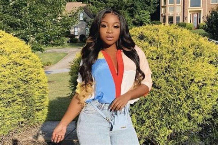 Reginae Carter Flaunts Her New Cleavage While Working Out – Check Out Her Tiny Waist As Well
