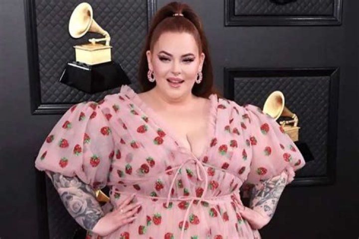 Tess Holliday Wears Lirika Matoshi Strawberry Midi Dress, Swarovski Crystals And Natalie Mills Jewelry On The Red Carpet